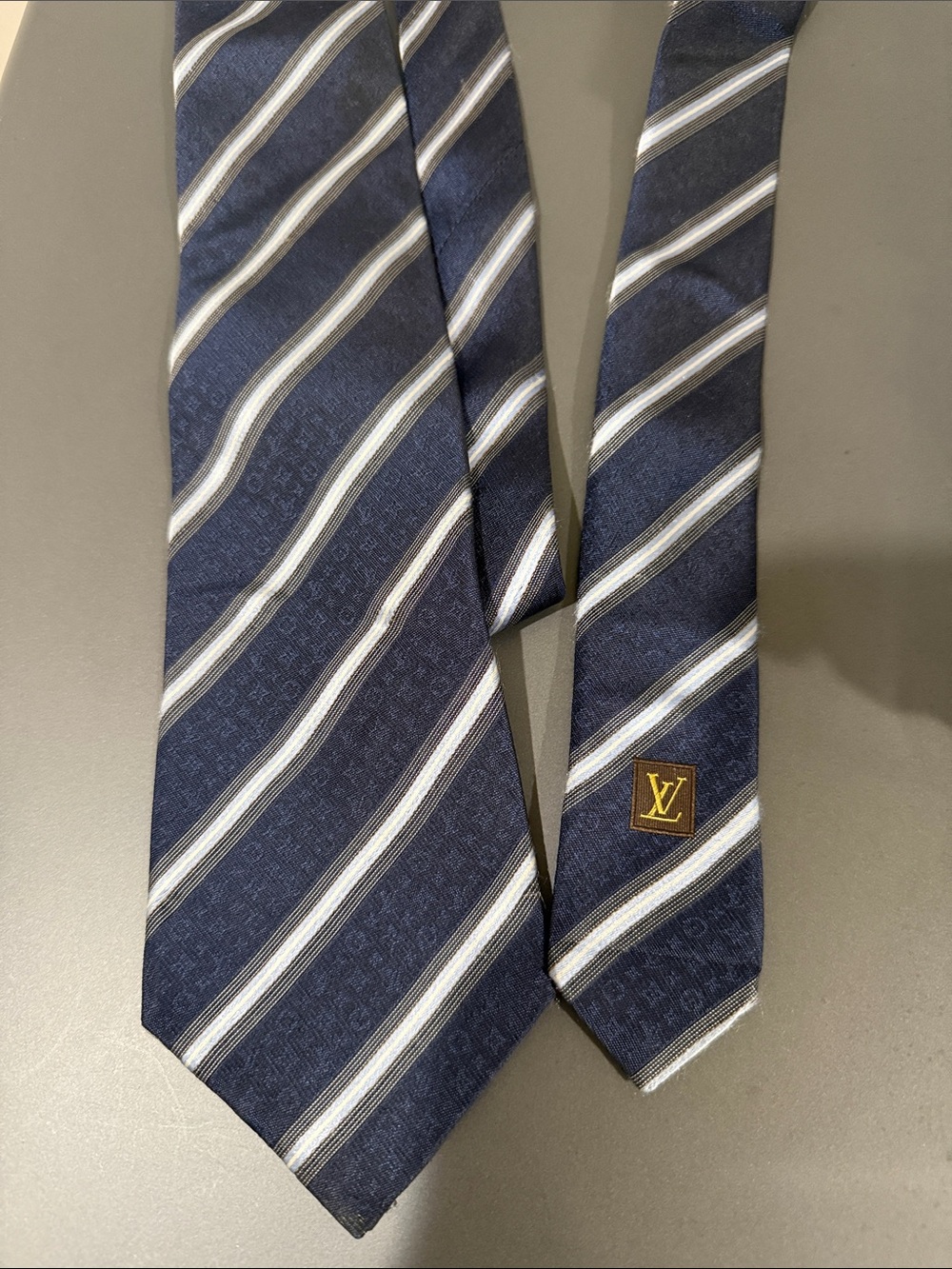 Authentic Louis Vuitton Navy Silk Striped Tie with Gold LV Emblem - Picture 2 of 5